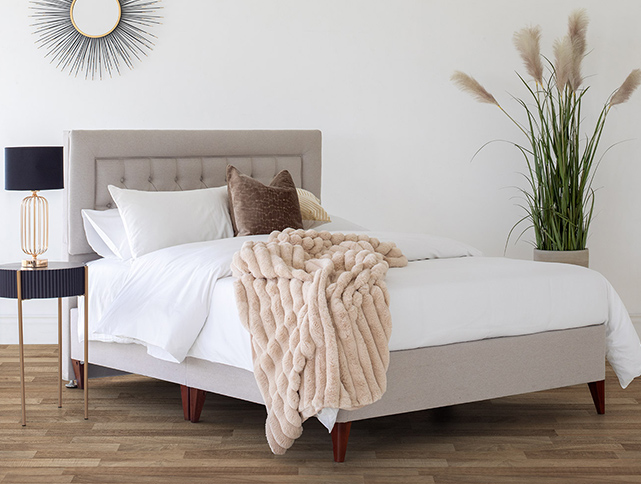 Image of a bed and bedding