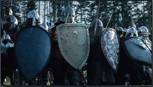 Armored medieval warriors with shields and swords