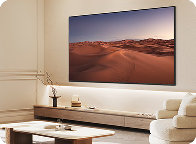 TV showing desert landscape on wooden console